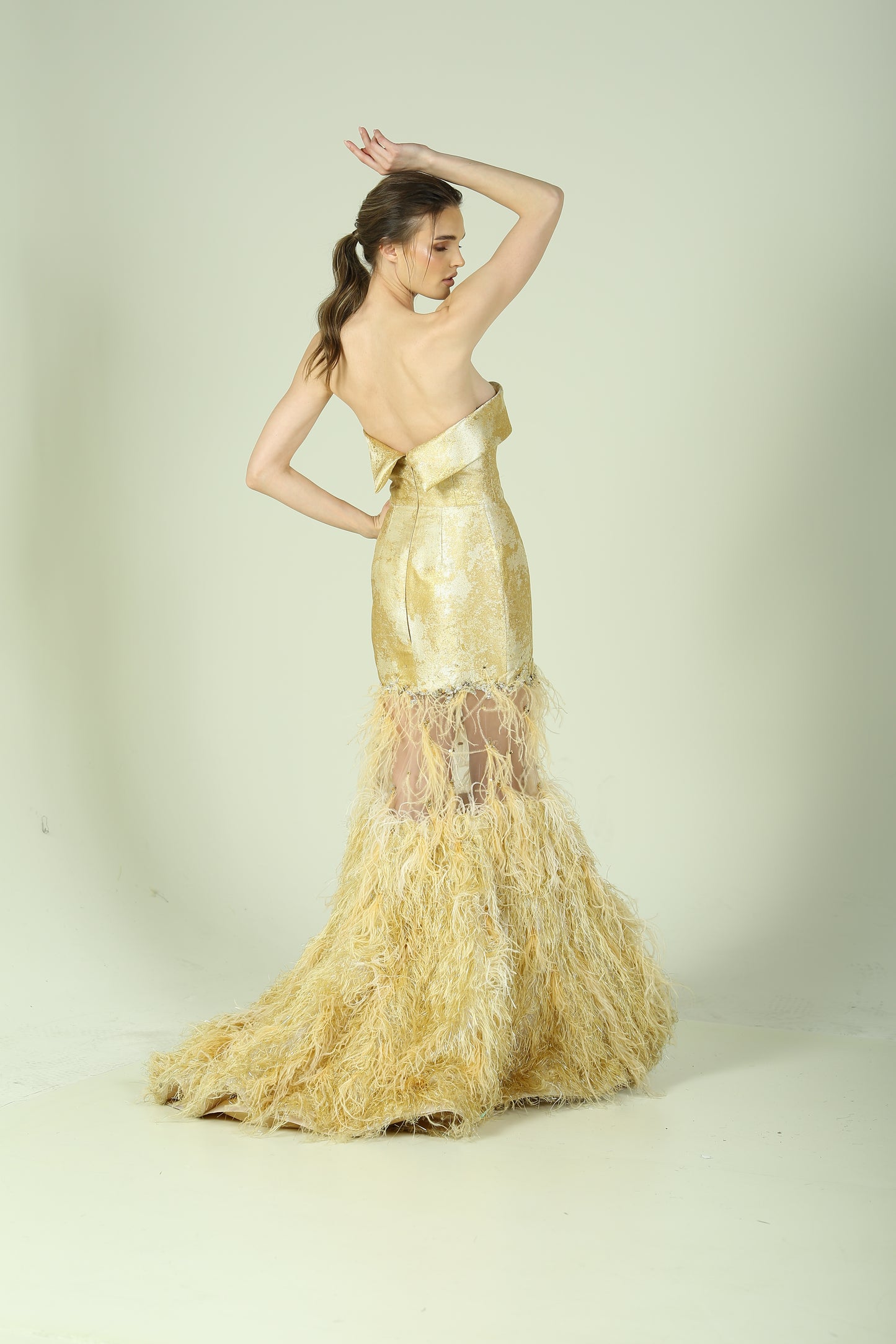 Golden Aura Gown – A Fusion of Glamour and Texture